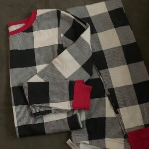 Place Black and White Checkered Pajama Set with Red Accents